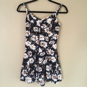 As seen on Modern Family! { Sunflower Romper }